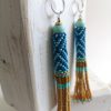 Boucles d'oreilles tissées, Héritage