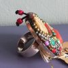 Grosse bague ethnique, le monde d'Alice, plaqué-argent .