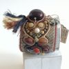 oznorHB Manchette, L'origine, graine et soutache