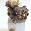 oznorHB Manchette, L'origine, graine et soutache